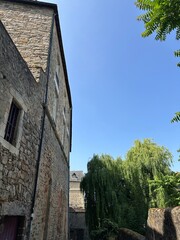 Charming French old town with half-timbered houses, gothic churches, and historic city walls – a...