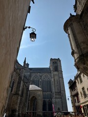 Charming French old town with half-timbered houses, gothic churches, and historic city walls – a...
