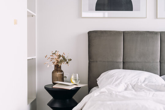 Bright and cozy hotel suite featuring a comfortable bed in the morning light