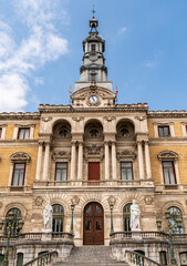 Bilbao City Hall building seen from the riverside. A historic architectural landmark reflecting the...