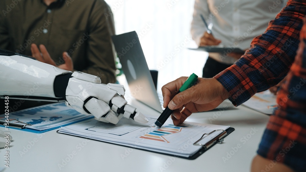 Poster a human hand collaborates with a robotic arm, showcasing innovative teamwork in a business meeting. 