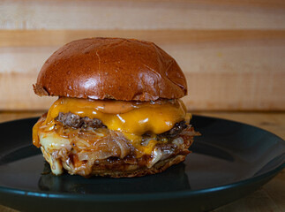 Double Oklahoma Smash Burger with cheddar and Jack cheese, grilled onions, and special sauce. 