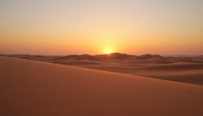 Obraz premium Golden hour illumination over undulating dunes in a vast arid desert landscape