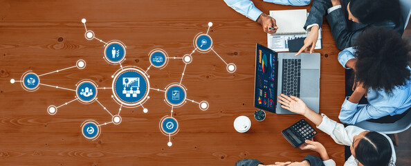 Panorama top view multiracial analyst team use BI dashboard display on laptop screen, analyzing...