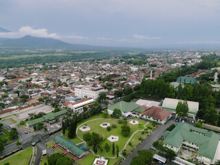 Aerial View Cityscape with Mountains, and Park.