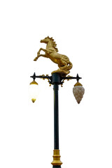 Lamp post with golden horse isolated on white background,