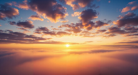 Beautiful horizon aerial view of sunrise or sunset sky. Cloudscape with golden sun above fluffy white clouds. Nature background, freedom concept.