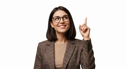 Young woman wearing glasses and a blazer points her finger up with a bright idea