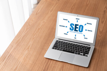 SEO search engine optimization for modish e-commerce and online retail business showing on computer...