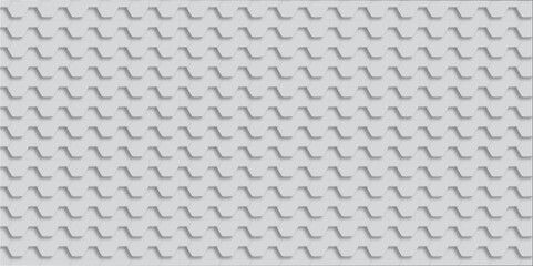 Here's a seamless gray metal diamond plate background pattern with a geometric surface texture