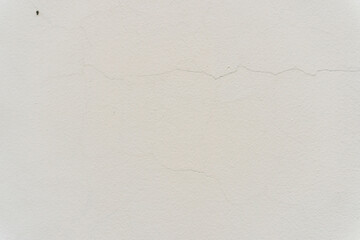 Smooth White Wall Texture with Subtle Cracks Ideal for Backgrounds and Design Projects