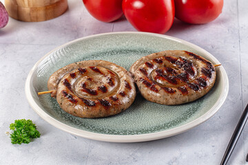 Grilled beef round circle sausages