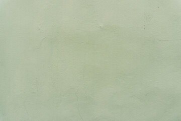 Soft Green Textured Wall Surface Ideal for Backgrounds and Artistic Designs in Modern Decor and...