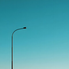 Minimalist Streetlight Against a Clear Blue Sky