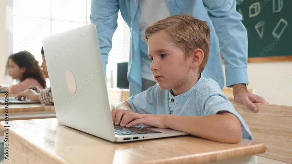 Poster caucasian teacher helping energetic boy coding engineering prompt while diverse student using softwa