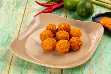 Fried crispy yellow cheese balls