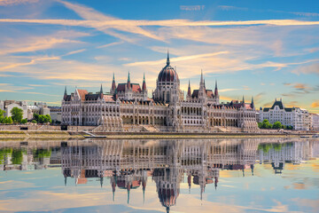 Budapest Parliament side view reflecting in Danube River, famous landmark of Hungary