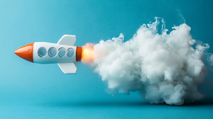 Toy rocket ship launching with smoke on blue background represents startup innovation and creative business growth