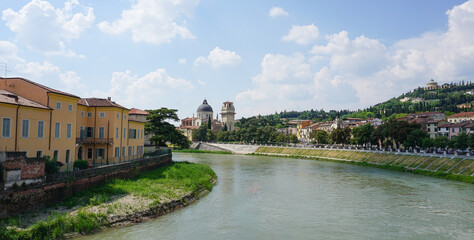 Verona - Church of San Giorgio in Braida in a sunny day with the Adige river.