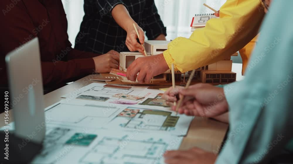 Aufkleber a diverse group of architects engages in a hands-on discussion about their design concepts and bluep
