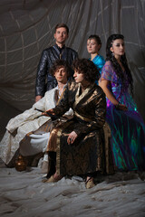 Oriental fantasy scene with Turkish-style dressed models in elaborate costumes, storybook...