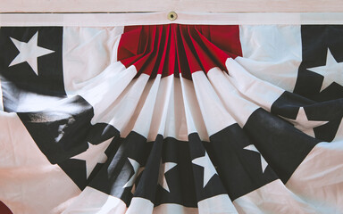 close-up of a pleated elegant American flag used for patriotic decorations. United States holiday...