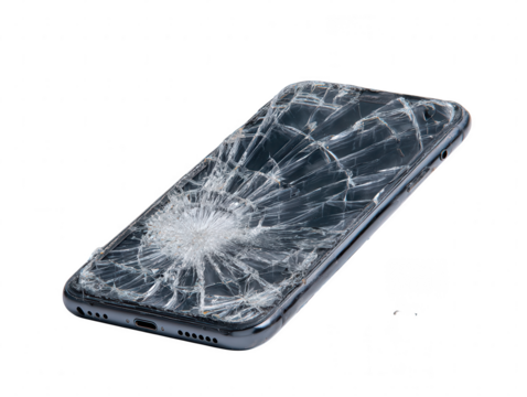 Close-up of a damaged smartphone with a shattered screen, symbolizing technological failure and repair needs