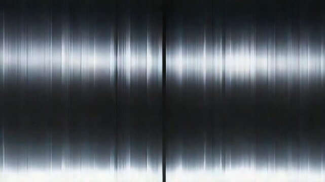 Abstract Metallic Cylinders in Dark Continuous Motion with Vertical Light Patterns