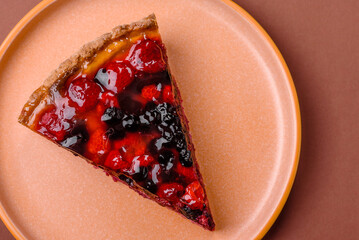 Pie, cheesecake with mascarpone, raspberries and blackberries. Cheesecake with cheese