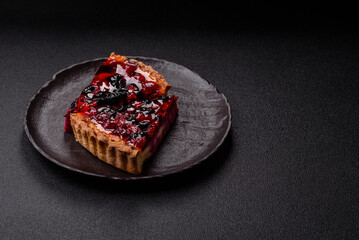 Pie, cheesecake with mascarpone, raspberries and blackberries. Cheesecake with cheese