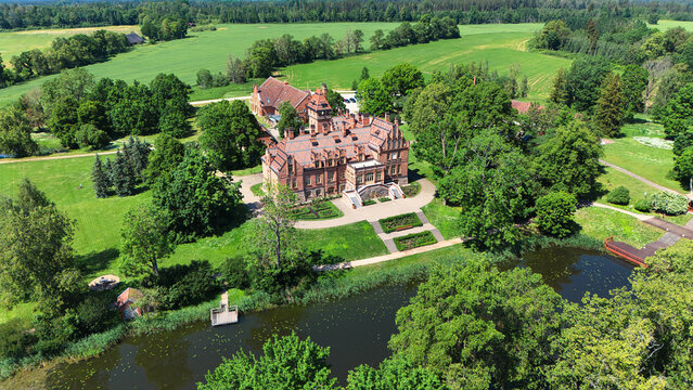 Drone View of Jaunmoku Palace in Tukums, Latvia - Historic Castle Surrounded by Nature