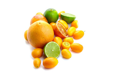 Fresh assortment of citrus fruits including oranges, limes, and kumquats arranged artistically on a white background, showcasing vibrant colors and textures for culinary inspiration