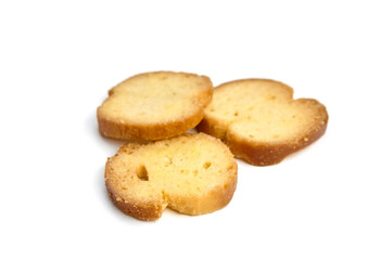 Bruschetta slices arranged on a clean white background, showcasing golden-brown edges and a crispy texture, perfect for culinary presentations and appetizing displays