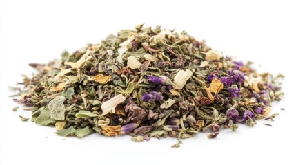 a pile of dried herbs on a white surface
