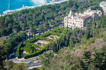 Savoring the stunning panoramic view of the vibrant city and bustling port while soaking in the...