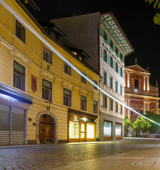 Franciscan Church of the Annunciation illuminated at night in Ljubljana
