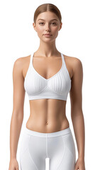 Obraz premium Woman wearing sports bra and leggings stands facing forward against a isolated background.