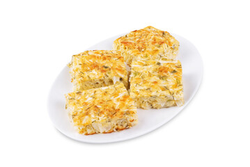 Cabbage cheese casserole in a plate on a white isolated background