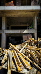 Construction Site with Lumber and Concrete Structure