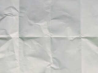 Pattern of folded white paper. Crumpled blank white paper folded in eight fraction background....