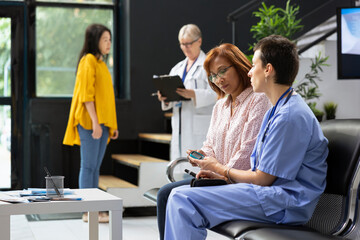 Medical assistant showing glucose levels test measurement for diabetes routine checkup in hospital...