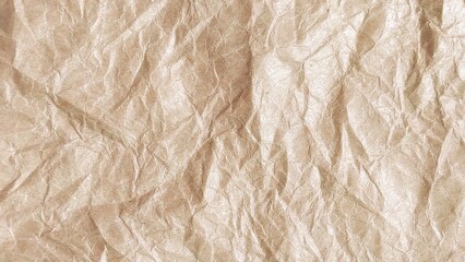 Brown crumpled paper pattern. Crumpled old brown vintage paper surface texture for background. Crumpled brown recycle paper texture. Paper board with copy space for text, space for copy.