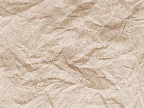 Brown crumpled paper pattern. Crumpled old brown vintage paper surface texture for background. Crumpled brown recycle paper texture. Paper board with copy space for text, space for copy. - Powered by Adobe