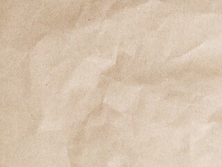 Brown crumpled paper pattern. Crumpled old brown vintage paper surface texture for background....