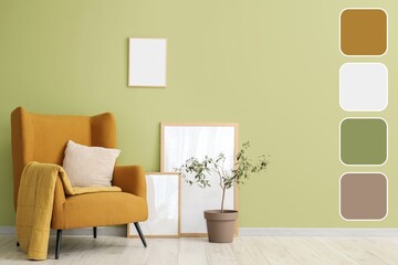 Yellow armchair with houseplant and frames near green wall. Different color patterns
