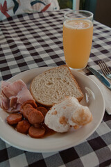 Traditional Breakfast with Ham, Sausage, and Bread
