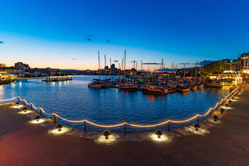 Fototapeta premium Inner Harbour with boats at evening in Victoria, Canada
