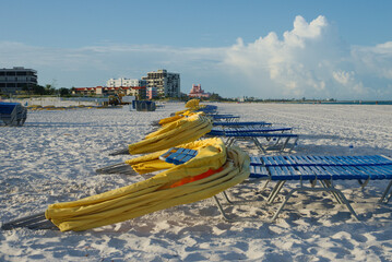 Beautiful Beachfront Scene Featuring Sun Loungers and Umbrellas With Stunning Blue Skies. St. Pete...