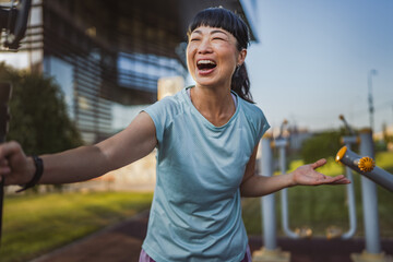 Japanese woman blogger record video for v-log and show outdoor gym
