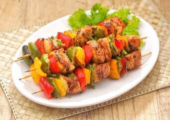 Shish kebab is a dish of square beef grilled and skewered. The dish is similar or synonymous with a dish called shashlik, which is found in the Caucasus region